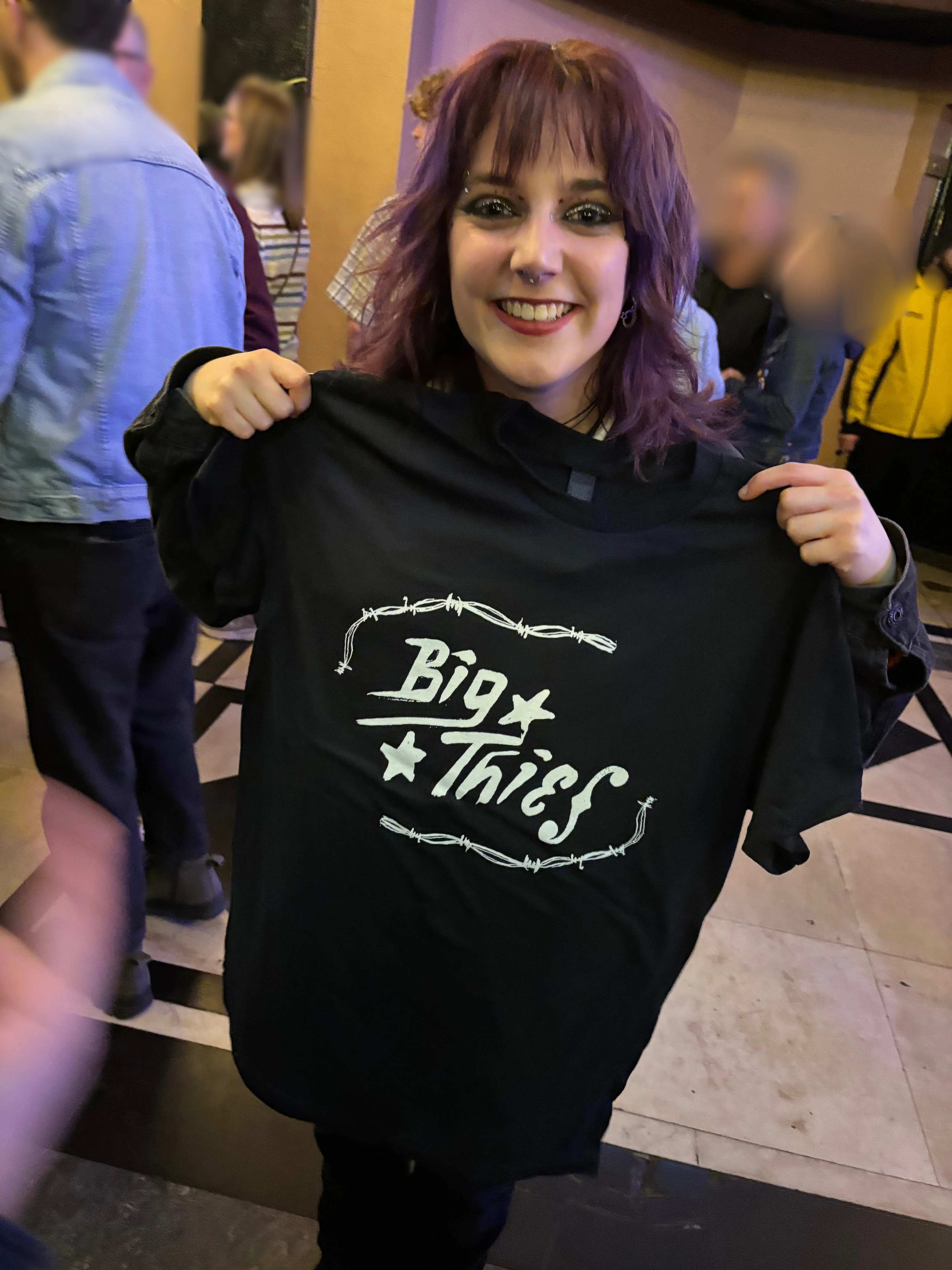 Loz with Big Thief merch